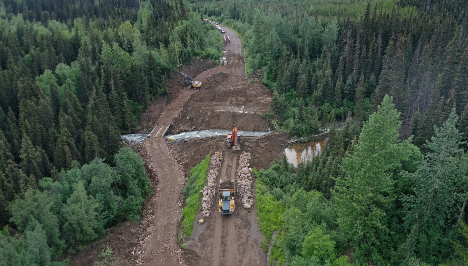 Dawson Road Maintenance installing a bridge on Babine Lake Road after the washout