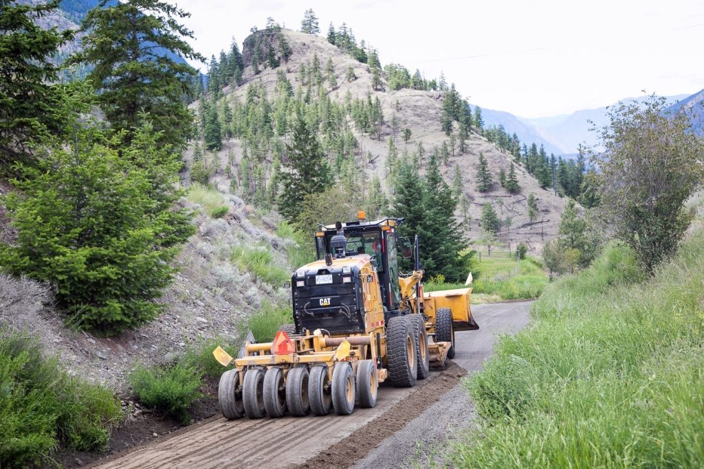 Dawson Road Maintenance grading in the Cariboo